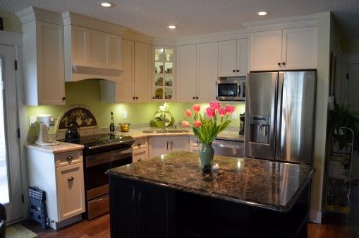 White kitchen with island.