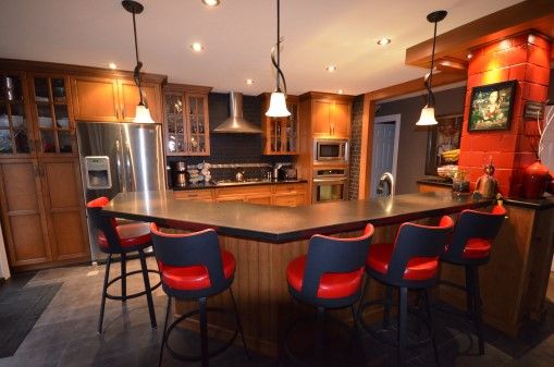 Kitchen with a raised bar.