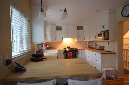 Kitchen with wood deck countertops.